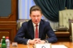 Alexey Miller während des Treffens mit dem Vizepräsidenten der CNPC, Wang Dongjin
