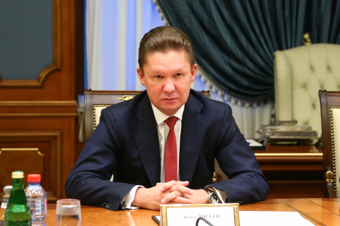 Alexey Miller während des Treffens mit dem Vizepräsidenten der CNPC, Wang Dongjin