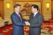 Alexey Miller während des Treffens mit Wang Yilin, Vorsitzendem des Board of Directors der CNPC