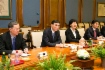 Jiang Jianqing (Zweiter von links) während des Arbeitstreffens mit Alexey Miller