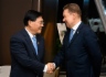 Alexey Miller und Huang Yongzhang