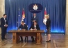 Alexey Miller und der serbische Minister für Bergbau und Energie, Aleksandar Antic, unterzeichneten im Beisein des Präsidenten der Republik Serbien, Aleksandar Vucic (hinten), eine Roadmap