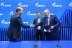 Stellvertretender Vorstandsvorsitzender
der Gazprombank, Alexander Stepanov,
und Oleg Aksyutin