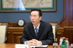 Wang Dongjin, Vizepräsident der CNPC, während des Arbeitstreffens mit Alexey Miller