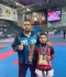 Trainer Sergey Mashchenko (links) mit seinem Schüler Egor Mokretsov (rechts)